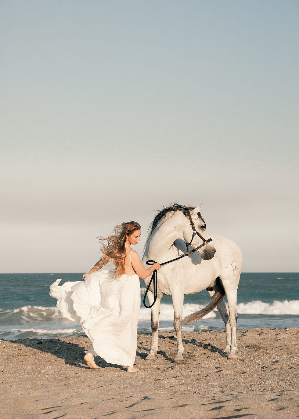 Laura Killian and Devoto, an andalusian gelding on the beach in florida