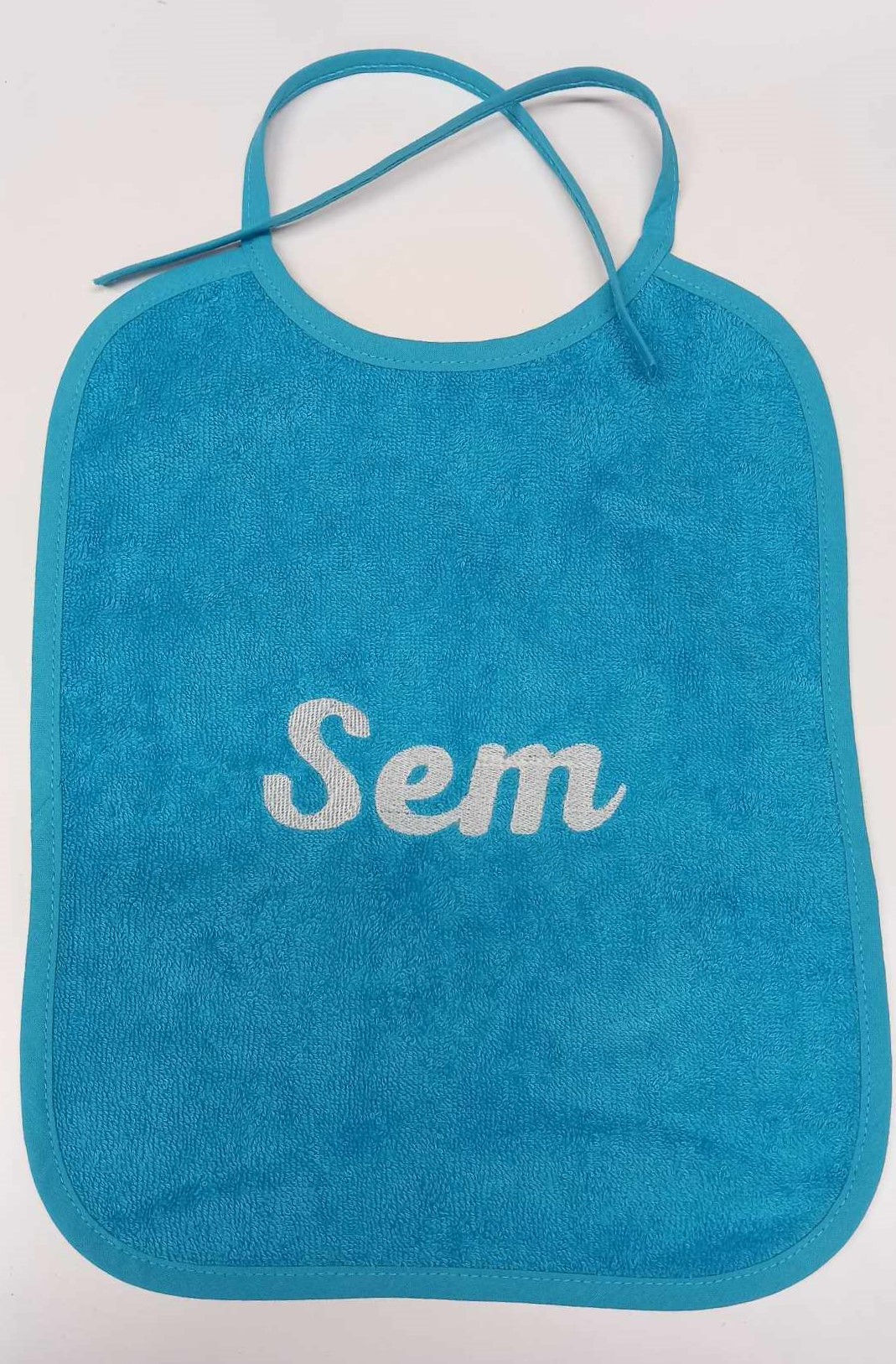 Badstof slab BLAUW met naam (GEBORDUURD)