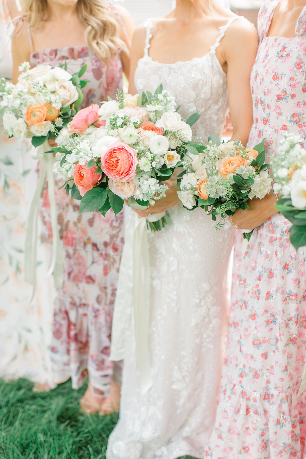 bridesmaids floral dresses at woodstock vermont wedding - new england wedding photographer and videographer