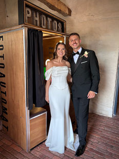 Happy couple with a Photo Booth