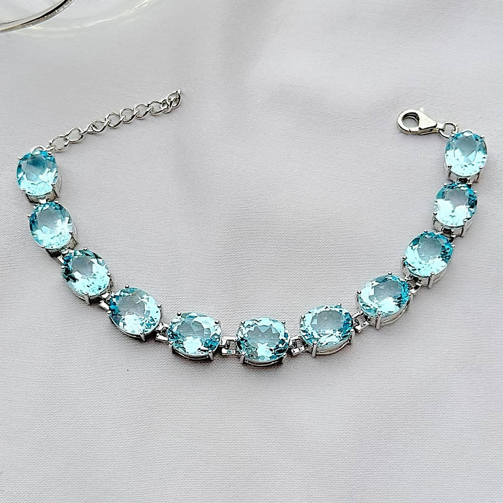 Thumbnail: Genuine Large Sky Blue Topaz Oval Tennis Silver Bracelet