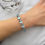 Thumbnail: Genuine Large Sky Blue Topaz Oval Tennis Silver Bracelet