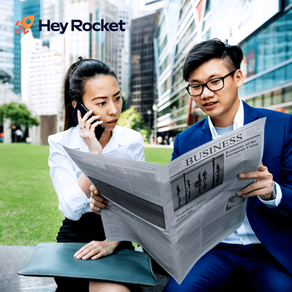 Business professionals reviewing labour market trends in Singapore amid skill shortages and hiring challenges in a tight workforce environment