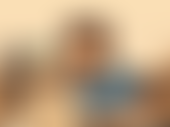 Man in blue shirt, looking exhausted, sits at a laptop in an office with books and a plant. "Hey Rocket" logo visible.