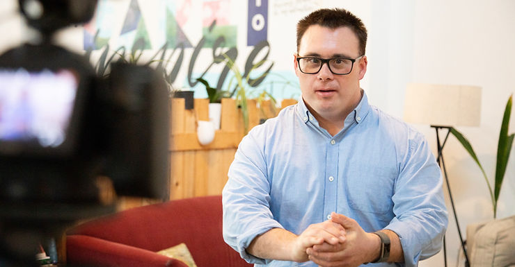 Businessman recording a corporate video