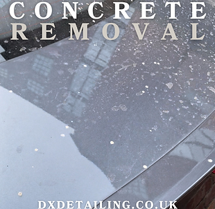 Vehicle boot lid contaminated with dried concrete splatter before professional concrete removal by DX Detailing in Manchester