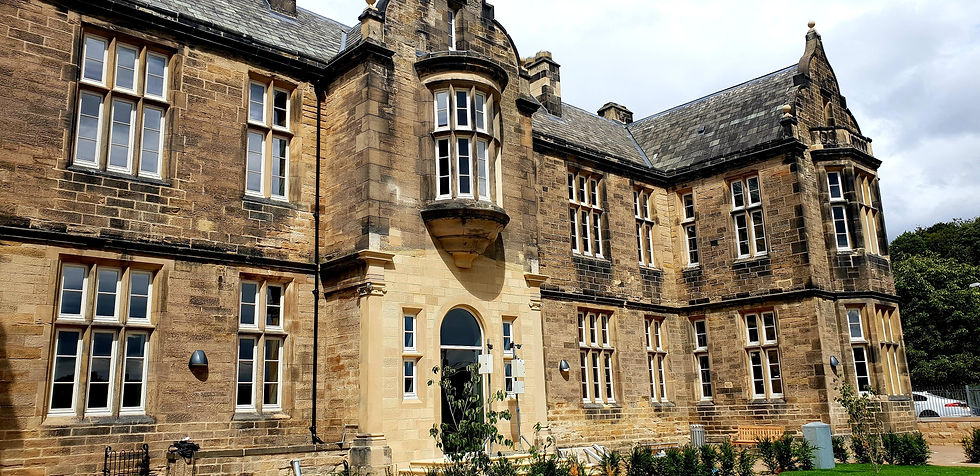 Photo of Durham's former hospital with new timber windows