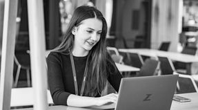 Job seeker optimizing her LinkedIn profile to get noticed by recruiters and land her next role.