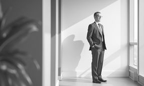 Professional reflecting on why it's so hard to get a job right now in a competitive and uncertain hiring market.