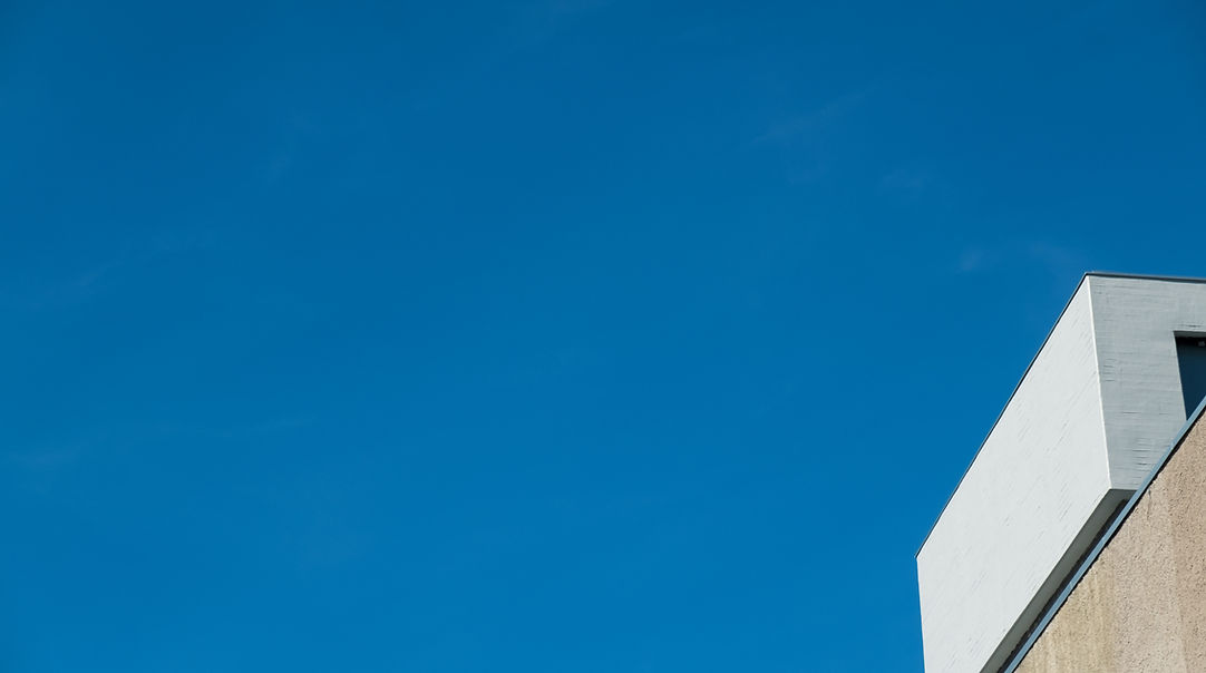 low-angle-view-building-against-blue-sky (1).jpg