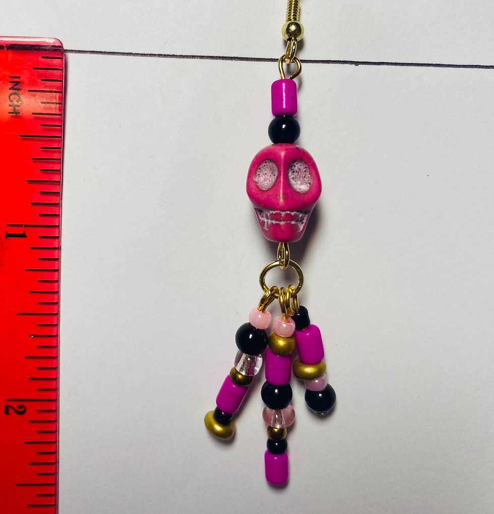 Thumbnail: Hot pink skull dangle earrings featuring black, hot pink, and gold  beads for Día de los Muertos measure