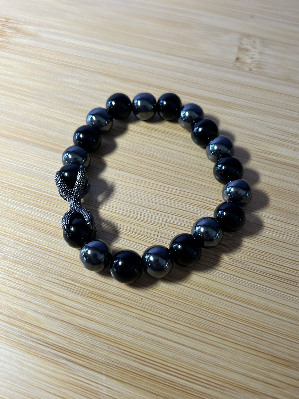 Thumbnail: Hematite & Black Glass Bracelet with Dragon Claw | Strength & Protection Jewelry
