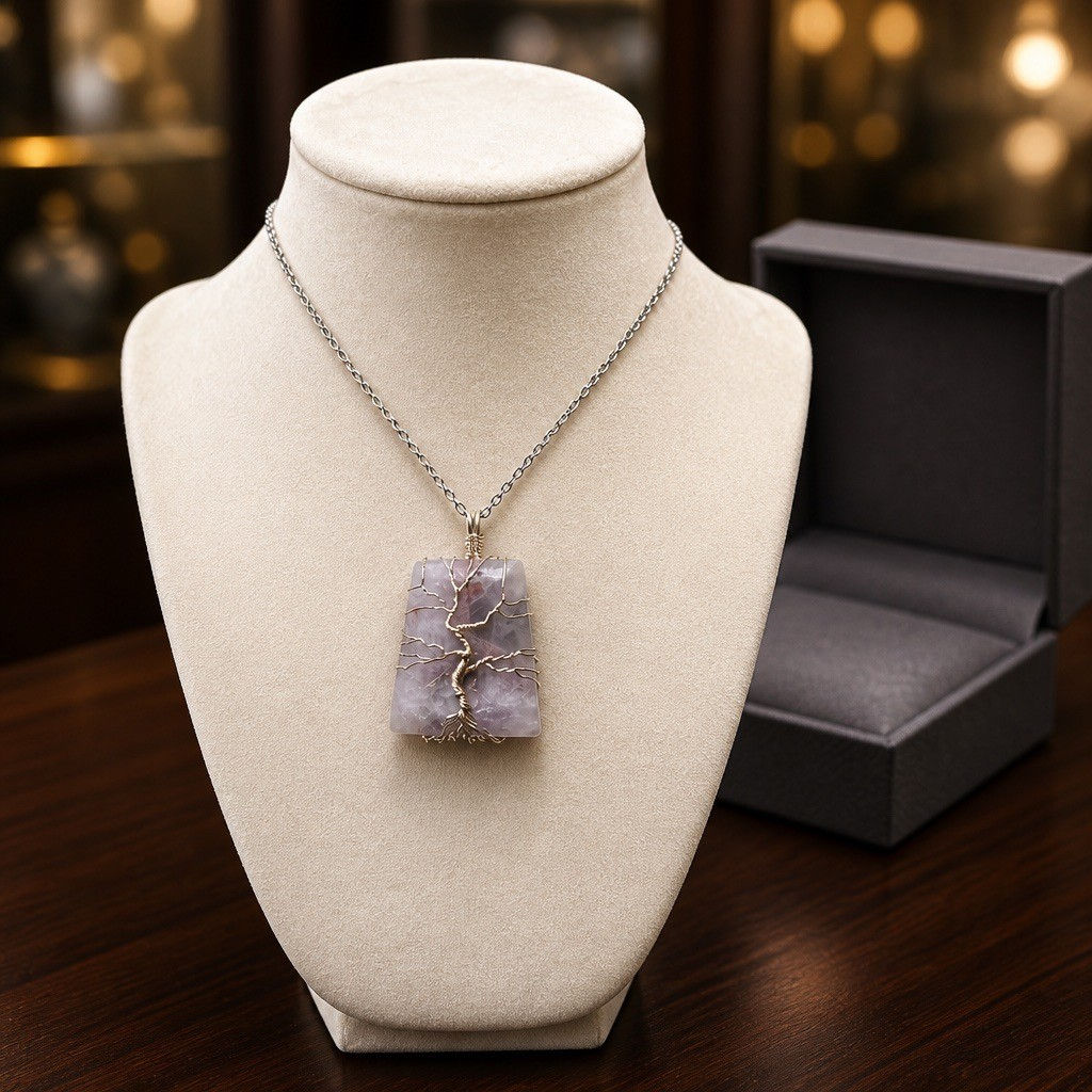 Handmade amethyst trapezoid pendant featuring a silver wire Tree of Life