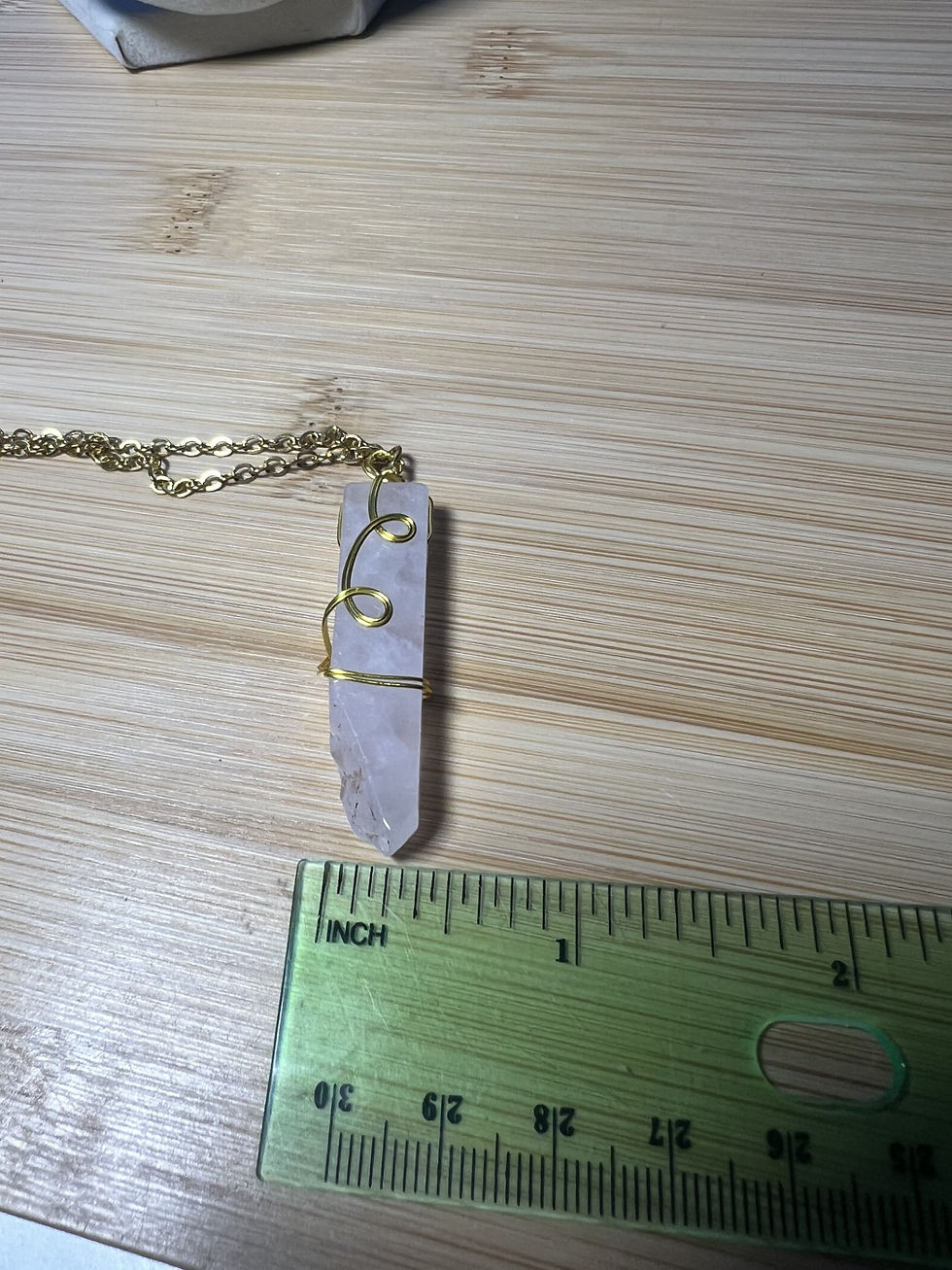 Thumbnail: Wire wrapped rose quartz necklace available in silver copper or gold wire width