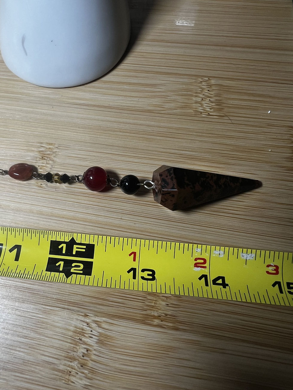 Thumbnail: Large Mahogany Obsidian Cone Pendulum – Bronze & Red/Black Beads length