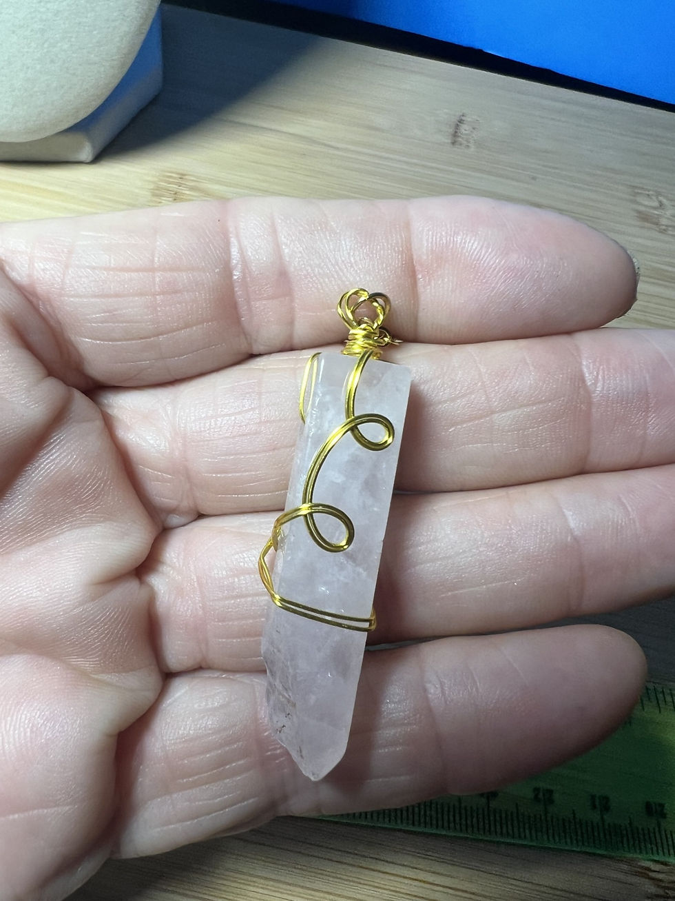 Thumbnail: Wire wrapped rose quartz necklace available in silver copper or gold wire in hand