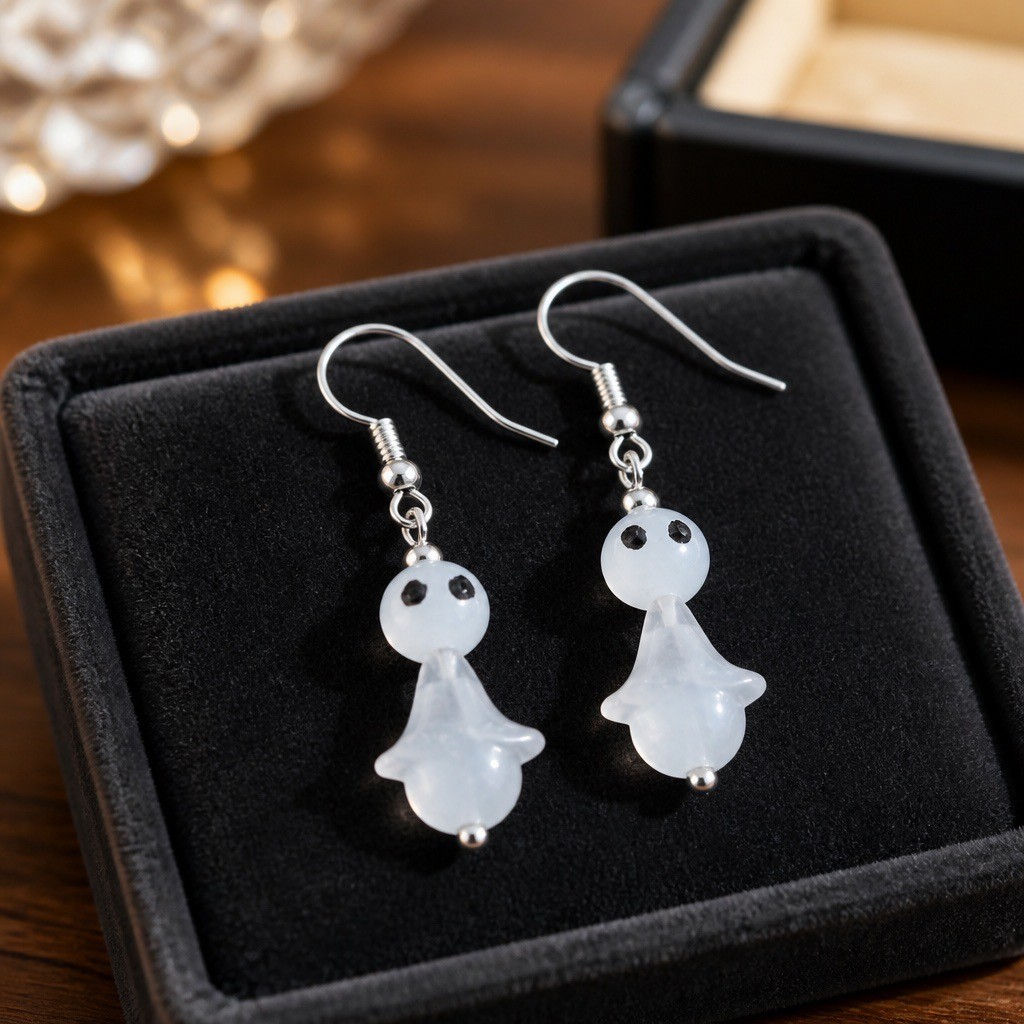 Handmade white ghost earrings with painted eyes