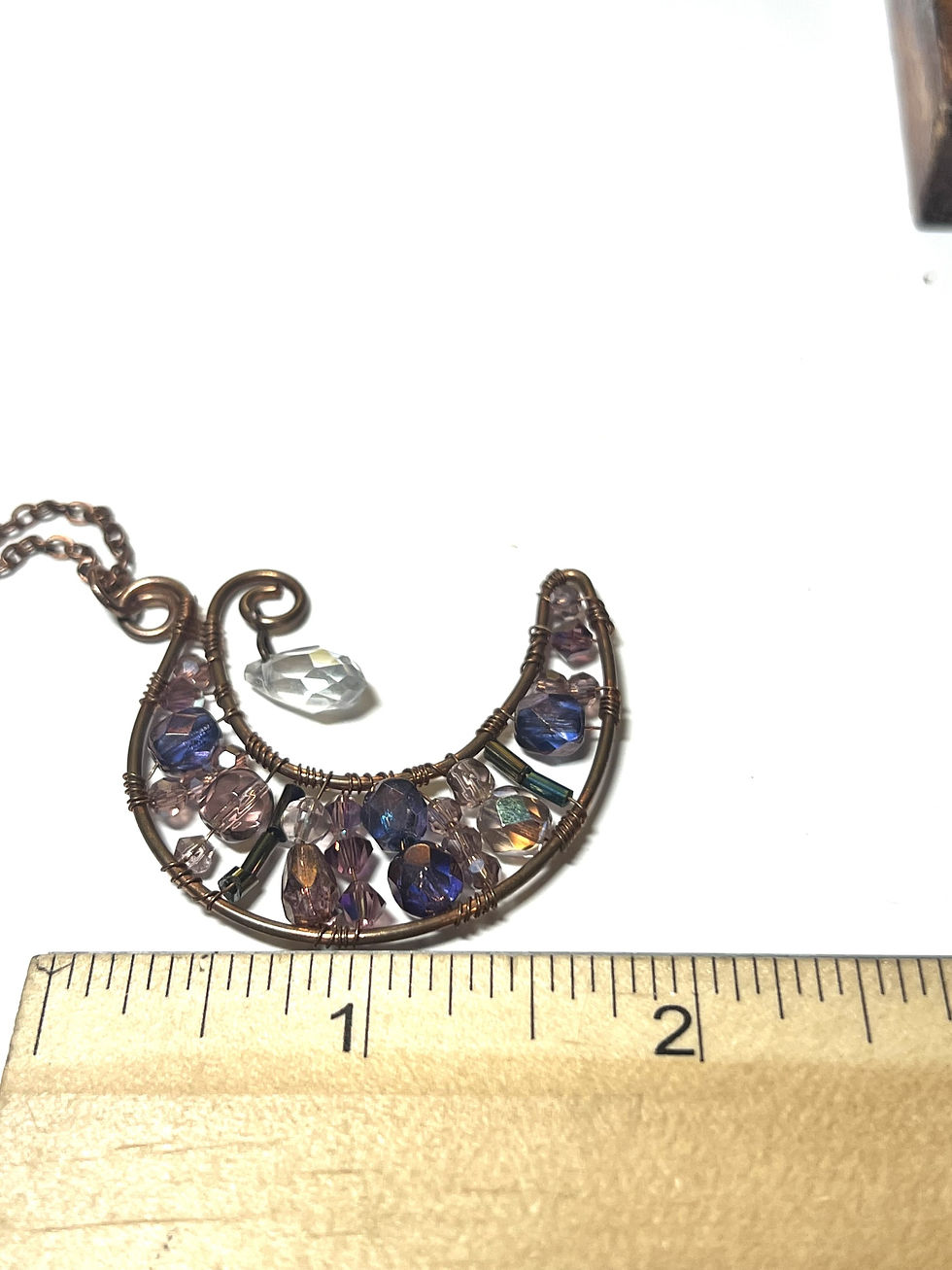 Thumbnail: Copper wire wrapped crescent moon pendant necklace with purple crystal beads and dangling crystal charm measure