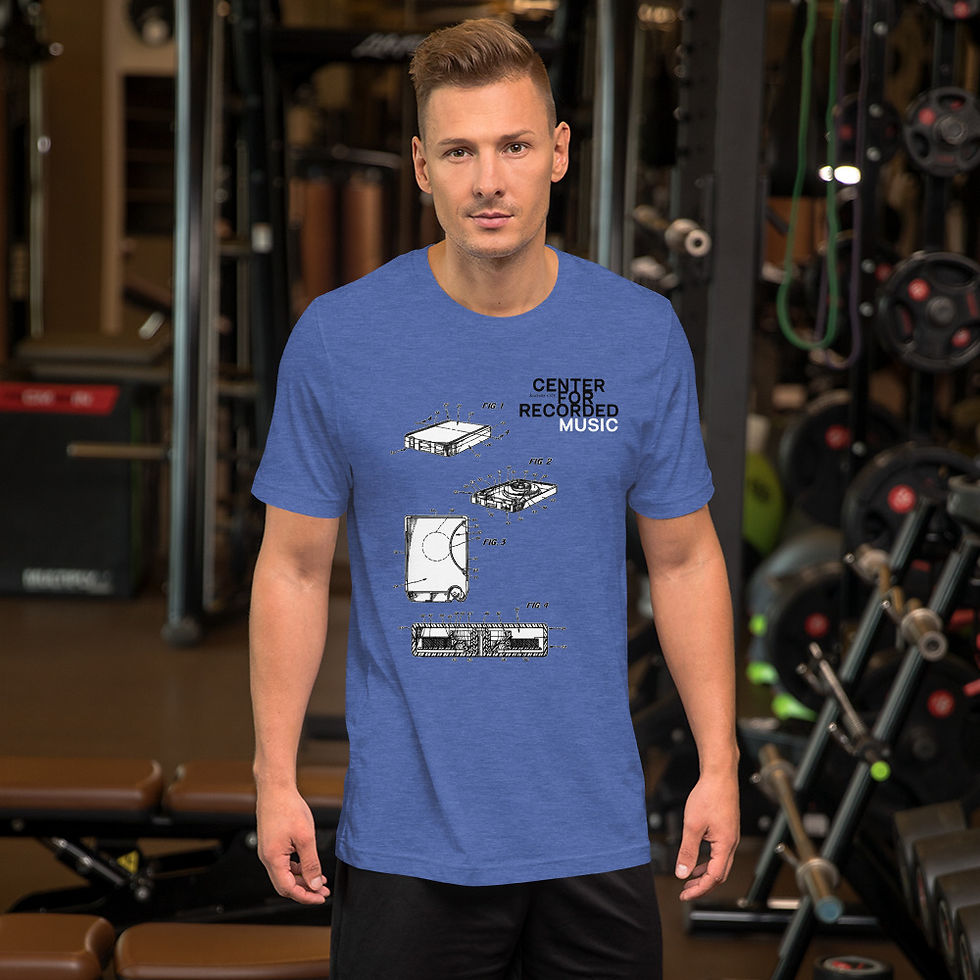 Thumbnail: Man wearing blue Uni t-shirt - C4RM 8-Track Drawing, standing in front of gym equipment.