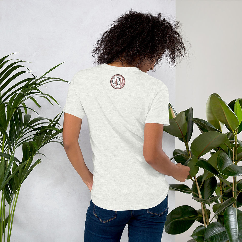 Thumbnail: Woman wearing A Decade of Listyning T-Shirt, standing in front of plants