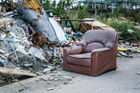 old-sofa-seats-were-dumped-garbage-dump-bin-128935294.jpg