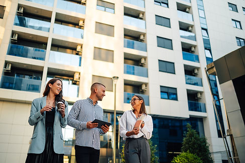 real-estate-agents-discussing-business-strategy-ho-2025-04-03-20-41-44-utc.jpg