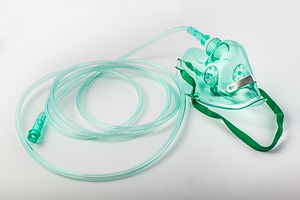 An oxygen mask attached to tubing