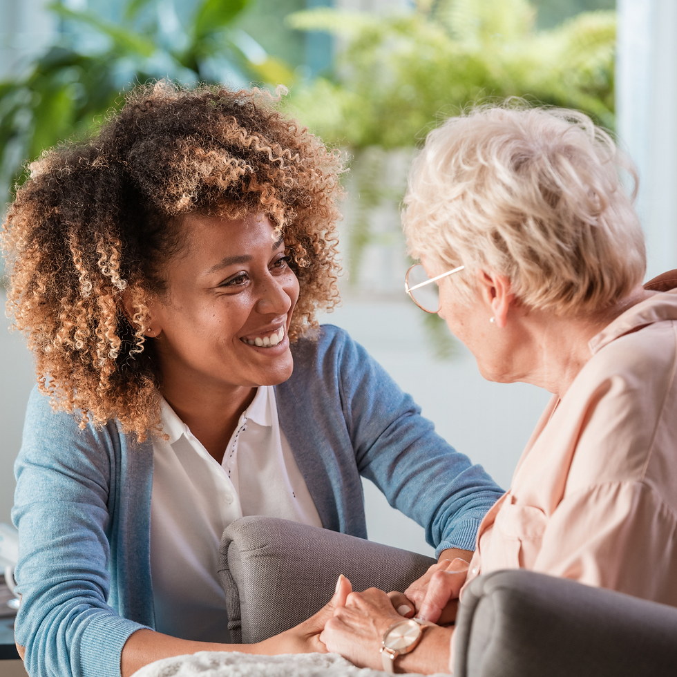 Heathcare worker and elderly person talking