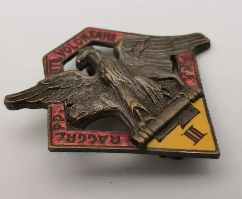 Thumbnail: GG.FF. DISTINTIVO BATTAGLIONE GIOVANI FASCISTI GIL II° RAGGRUPPAMENTO VOLONTARI PNF AOI