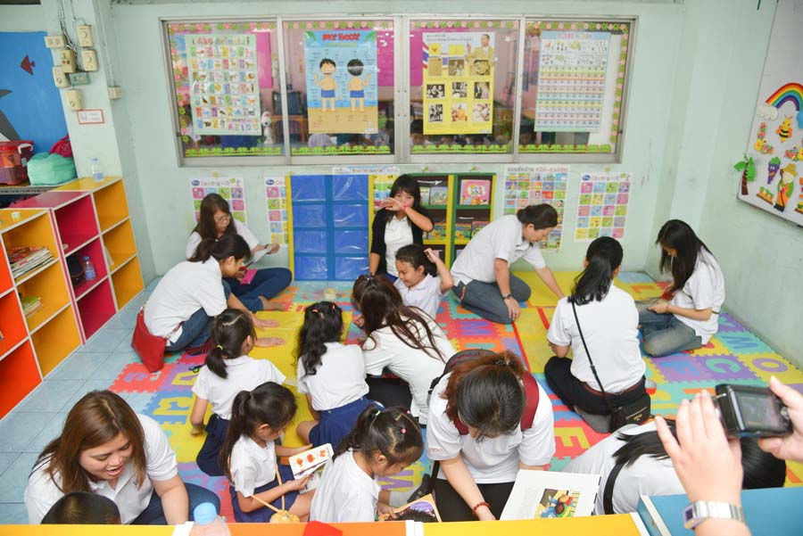 Thumbnail: CSR Team building activity designing a library
