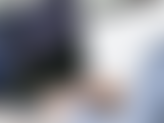 Person reviewing financial market charts on a laptop