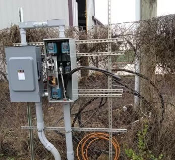 Meter box on side of fencing 