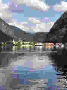 An image of a fjord, with a village in the background