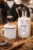 Creamy maple coffee cocktail with whipped cream and chocolate in a mugà