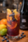 Blueberry sangria made without grapes with citrus, sparkling water and fresh fruit