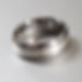 centre silver and titanium mens ring with matte top and polished sides