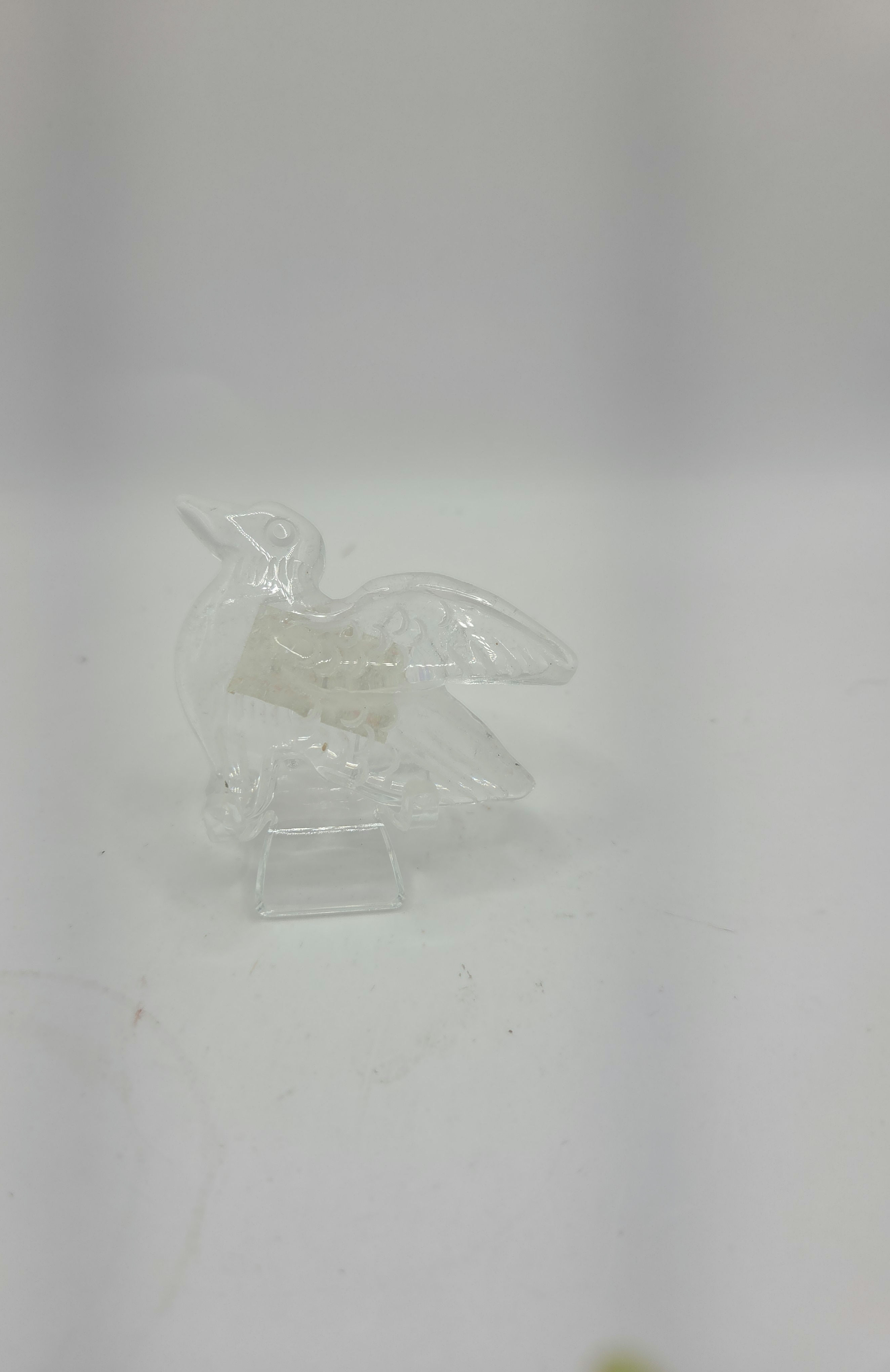 Clear quartz humming bird carving