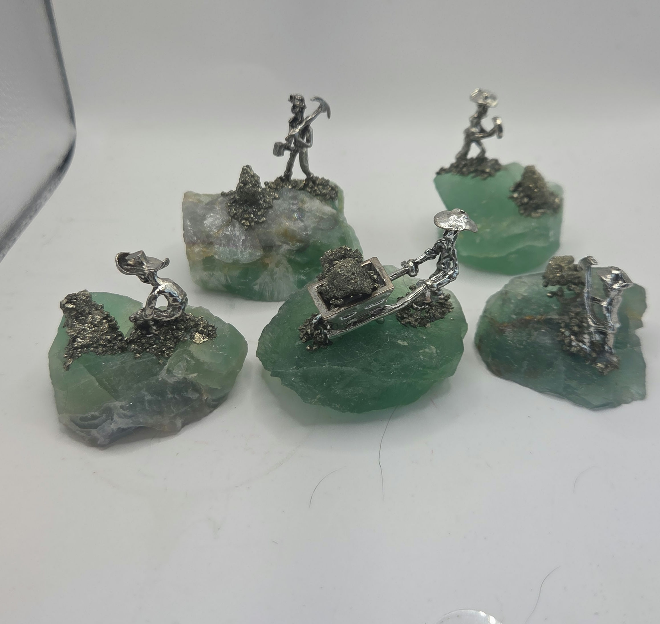 Minners on fluorite ruff minning pyrite