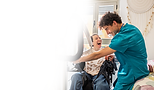 Young Male nurse working with a Developmentally disabled young adult