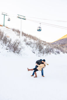 Couple Portraits on the snow after proposal