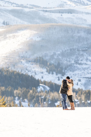 Couple kissing on Little Baldy Peak in Deer Valley Reosrt