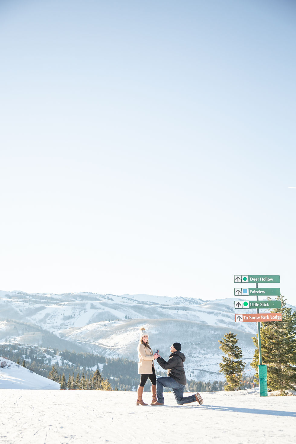 Boyfriend kneeling down to ask girlfriend to marry him