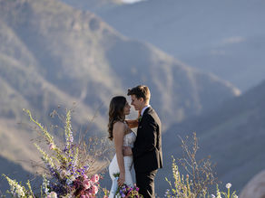A couupke exchanging vows at High Mountain Weddings