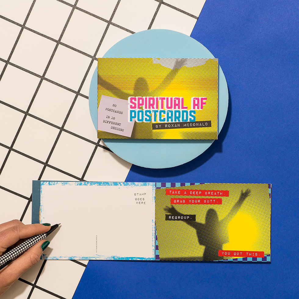 Thumbnail: A person's hand holding a pen, about to write on the blank back of a "Spiritual AF Postcard."