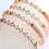 Thumbnail: polymer disc beads, with white round beads with gold lettering "Grateful" "Hope" "Inspiration"