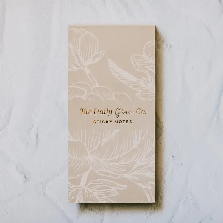Thumbnail: cream colored booklet that holds all sticky notes