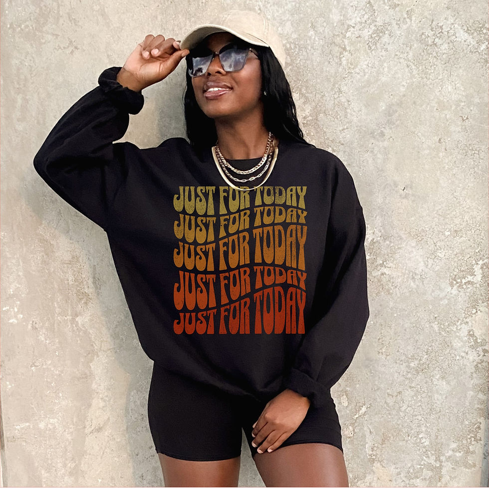 Thumbnail: Woman wearing crewneck with "Just for today" logo with yellow fading into red
