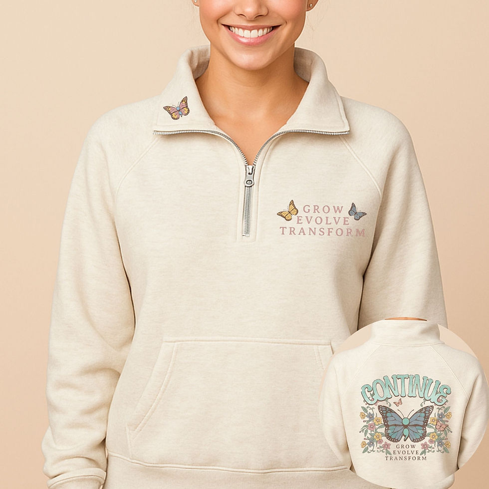 Front view of woman smiling in sweatshirt with butterfly detail on collar