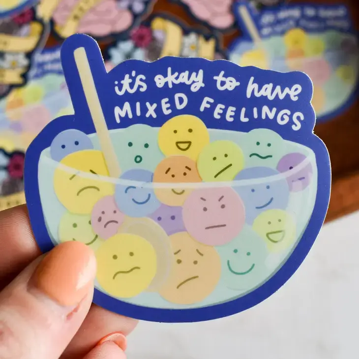 clear bowl, full of emojis, and a mixing spoon