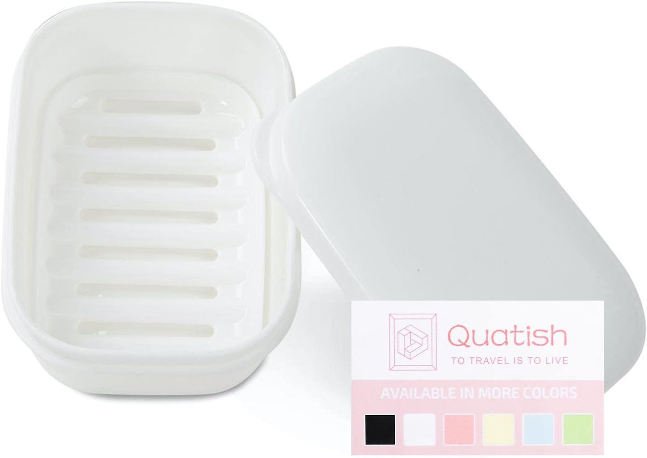 White plastic soap dish with removable lid and drainage slots.